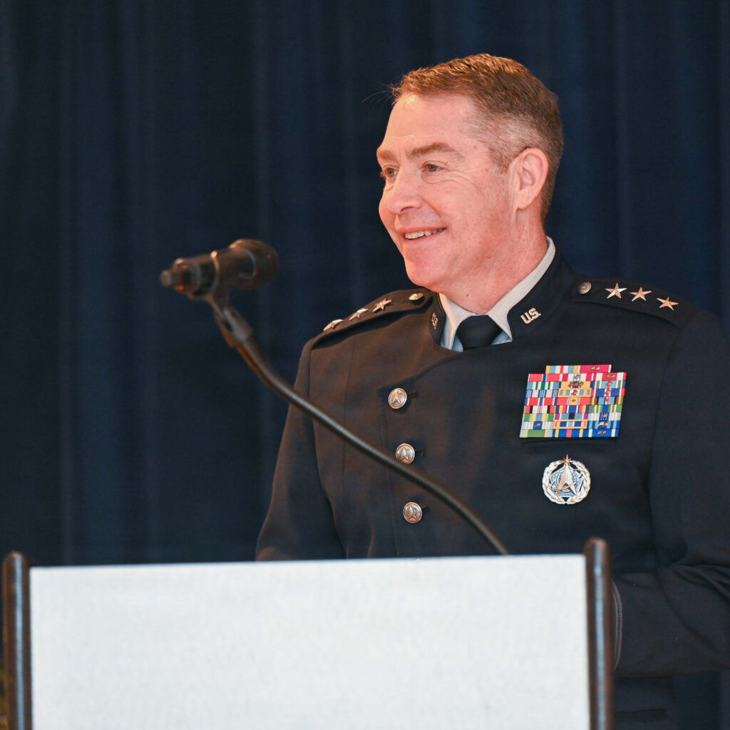 A man in a uniform at a podium.  Gen. Gagnon 