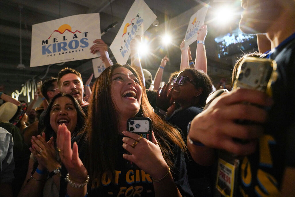 Attendees celebrate after Democratic congressional candidate Melat Kiros won the Democratic nomination during a primary election night watch party at The Broadway, Tuesday, June 30, 2026, in Denver. (AP Photo/Rebecca Slezak)