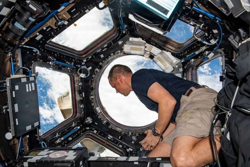 NASA astronaut and Expedition 67 Flight Engineer Bob “Farmer” Hines looks at the Earth while orbiting 260 miles above the Atlantic Ocean aboard the International Space Station, Oct. 2, 2022. NASA has selected Col. Hines, an Air Force test pilot with more than 4,000 flight hours across 50 aircraft types, to train with its prime crew for Artemis III as an alternate crew member. (Photo courtesy of NASA)