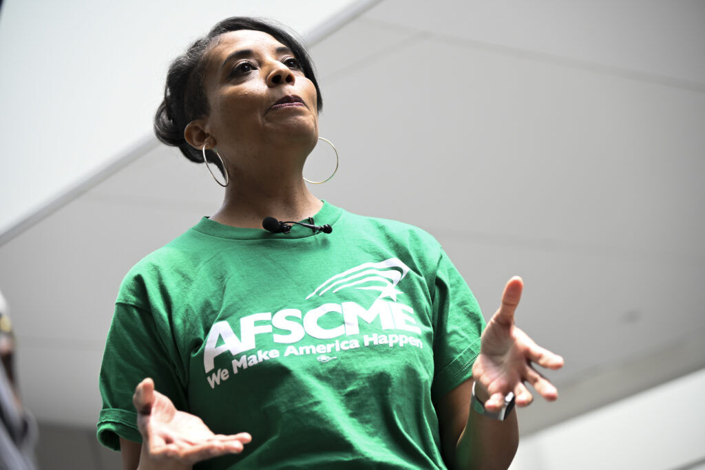 a woman in a green shirt