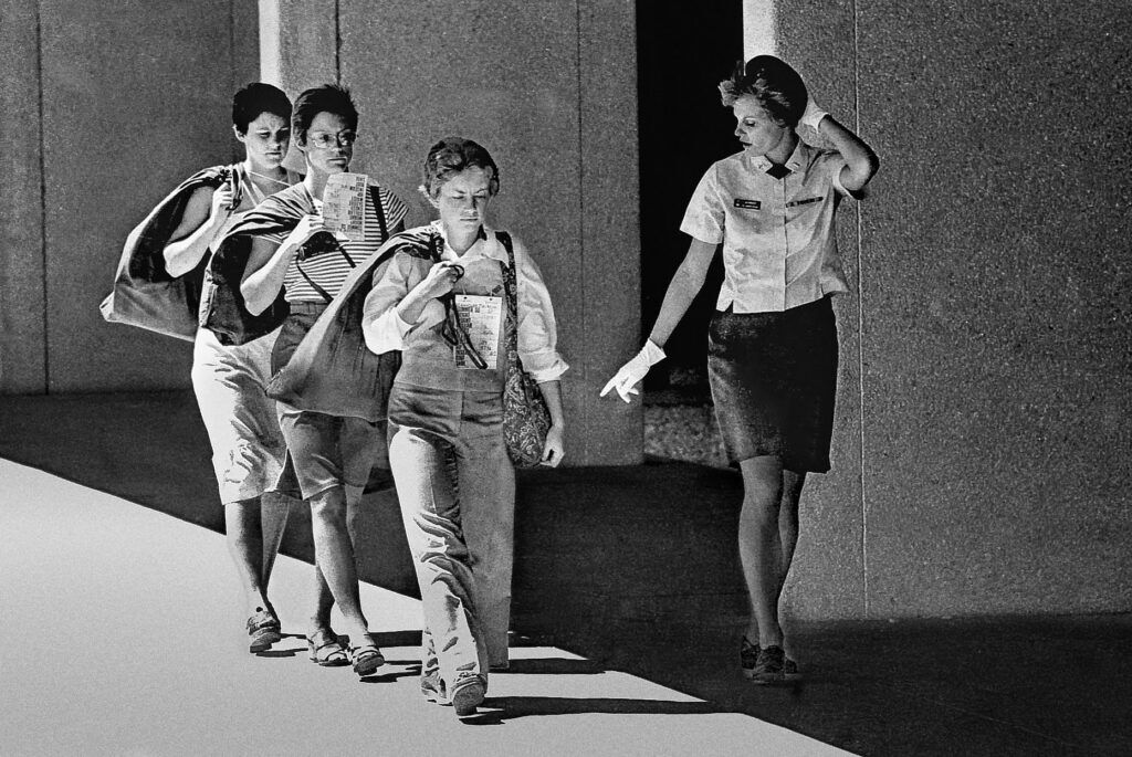 Air Force Academy cadet Jane Chandler is pictured in front of two other cadets. The ladies who arrived at the academy in 1976 were issued both skirts for class and pants for training. Photo by Ed Lallo, Getty Images