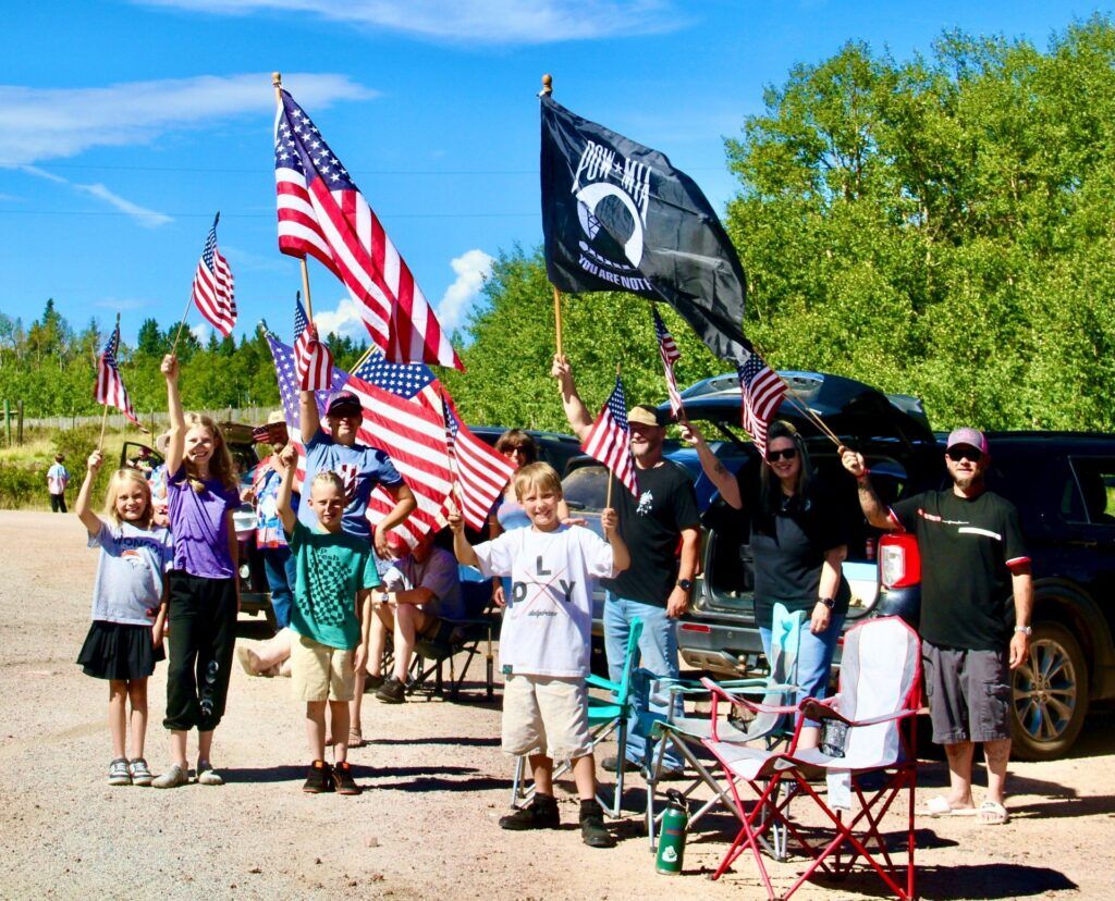 Motorcyclists driving into the City of Cripple Creek were greeted with a welcoming American flag as they joined the parade honoring the 2026 Salute to American Veterans Rally. (Sonja Oliver, Pikes Peak Courier)