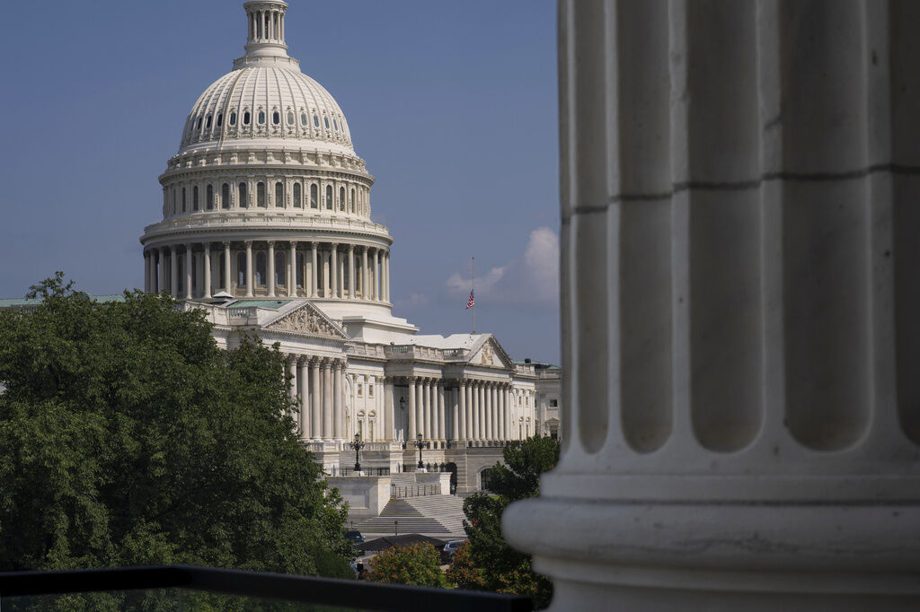 The U.S. Capitol is seen from the Cannon House Office Building as Republican lawmakers passed a bill to fund the federal government through Dec. 4, in Washington, Wednesday, July 22, 2026. (AP Photo/J. Scott Applewhite)