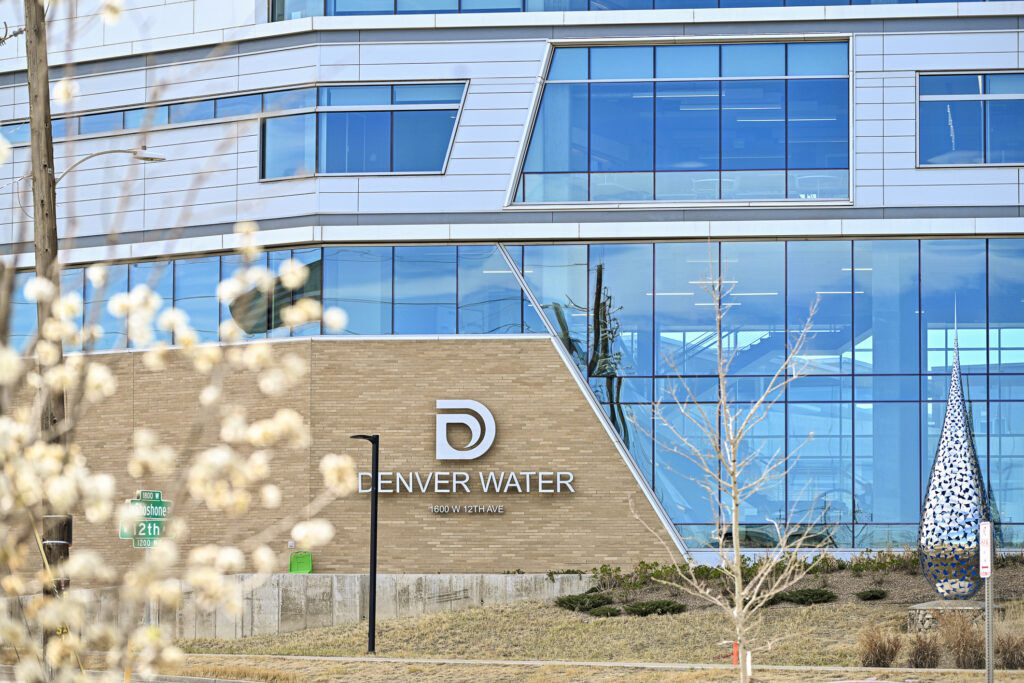 front of a glass business building
