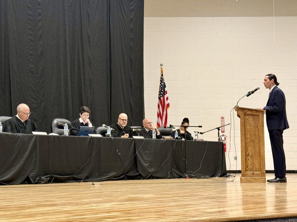 Attorney NoahLani Litwinsella argues to the Colorado Supreme Court during its "Courts in the Community" visit to Holyoke Junior/Senior High School in Holyoke, Colo. on April 16, 2026. Michael Karlik, Colorado Politics.