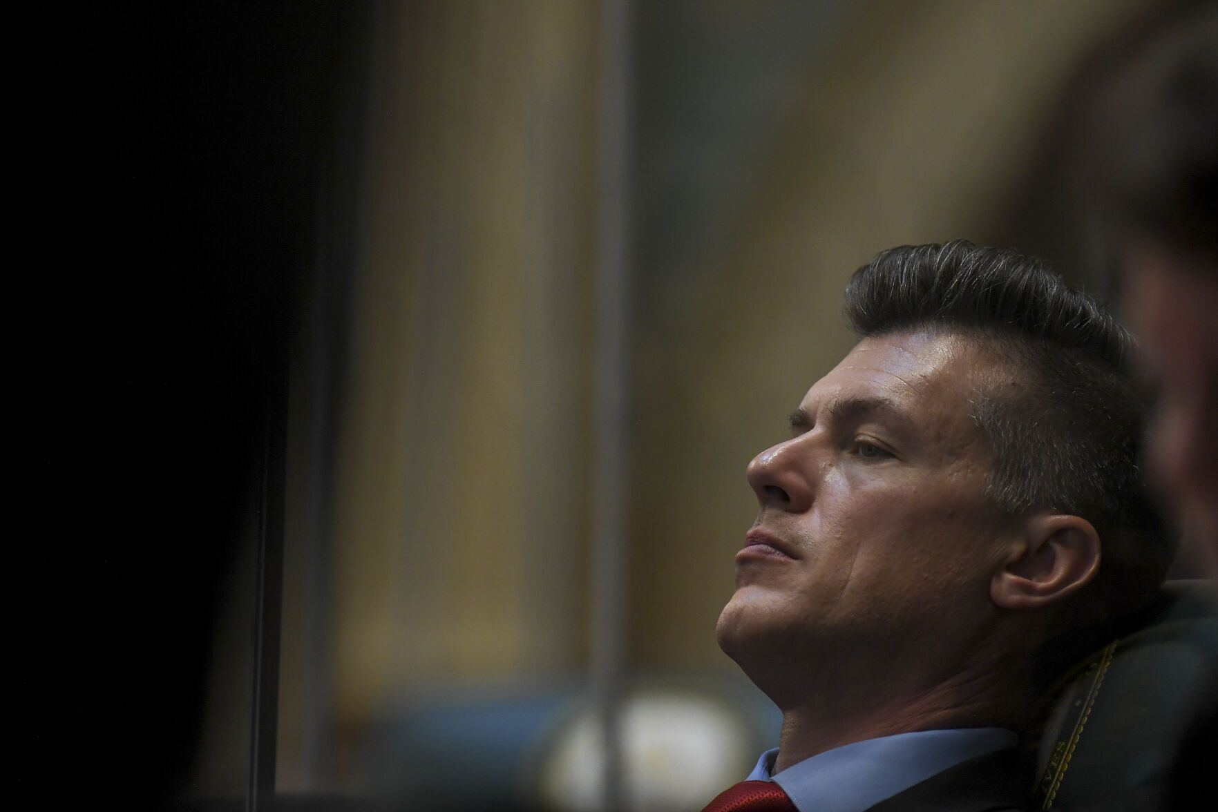 Rep. Dan Woog, R-Erie, listens as Gov. Jared Polis delivers his State of the State address to the Colorado House of Representatives in January 2025. (Aaron Ontiveroz, Pool photos)