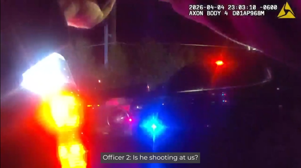 A screenshot of an unidentified officer's body camera footage showing another unidentified officer questioning if Benjamin Greenfield fired a gun shortly before his death on April 4, 2026. (Courtesy of the Colorado Springs Police Department)