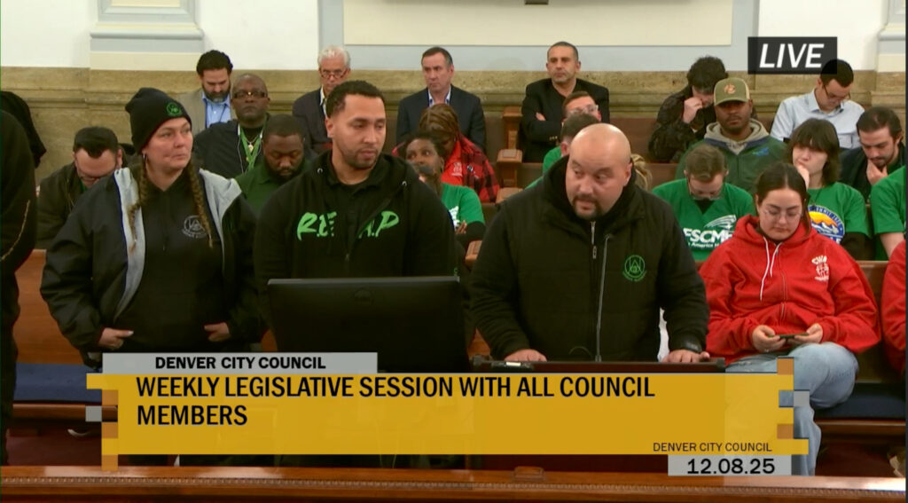 people speaking at a a podium