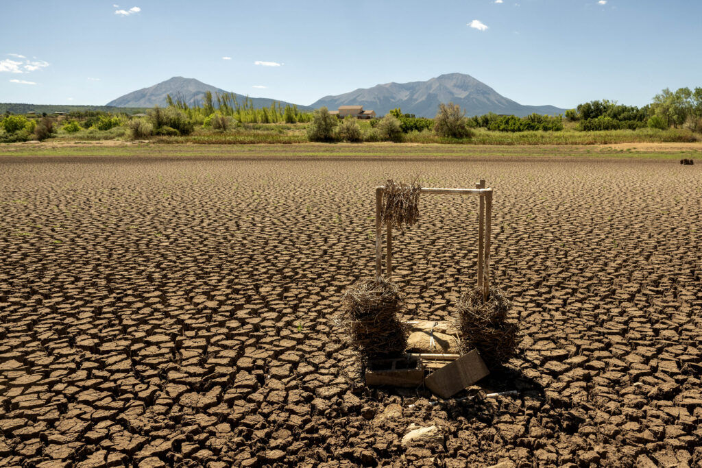 A metal structure is revealed on the dry lake bed of Wahatoya Reservoir in La Veta on Wednesday, September 2, 2026.