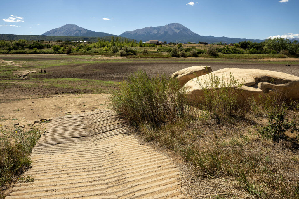 A boat launch leads to a dry lake bed at Wahatoya Reservoir in La Veta.