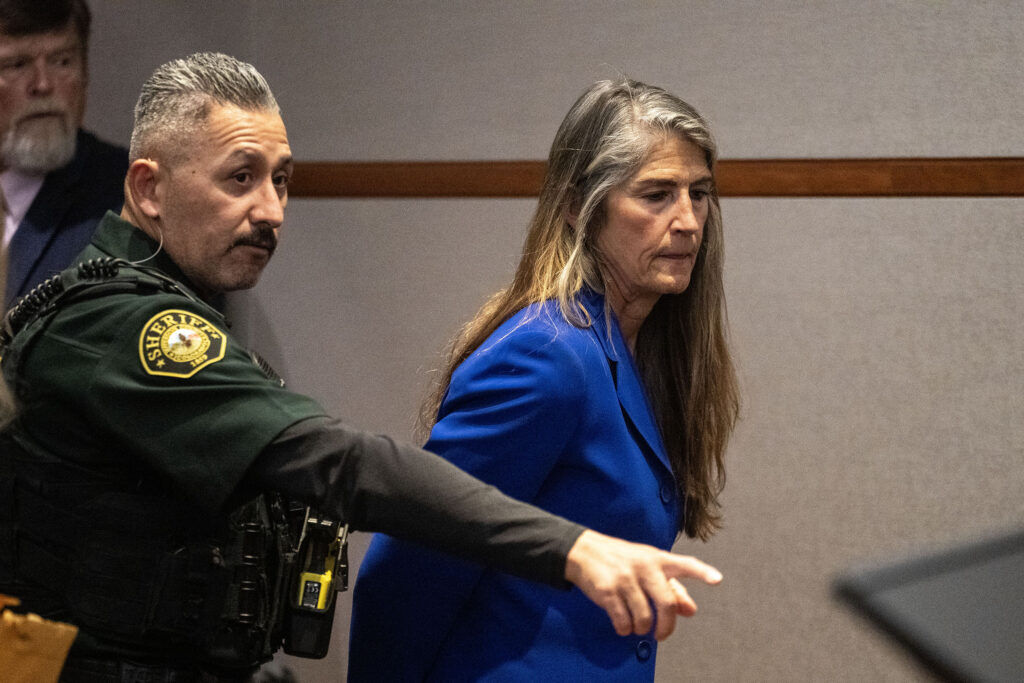 Missy Woods is put into handcuffs after being sentenced to ten years for cybercrime and two six year sentences for other crimes she pled guilty to which will be served simultaneously at the Jefferson County Courthouse on Tuesday, Sept. 8, 2026.